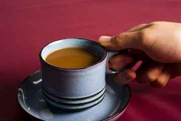 coffee mug being held