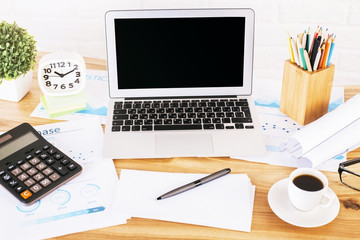 Fototapeta premium Black laptop and tools front