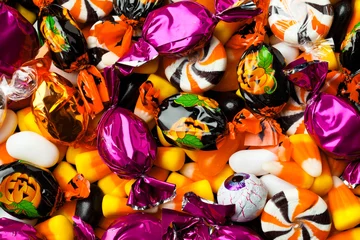 Fotobehang close-up of multicolored candies. © Dan Kosmayer