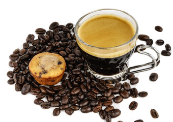 Fresh muffin, coffee cup and coffee beans - healthy breakfast