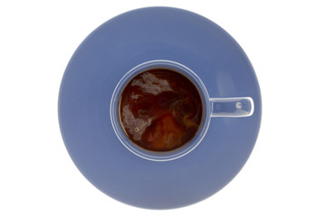 top view of cup and saucer over white background.