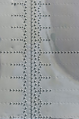 grunge background metal texture with screws