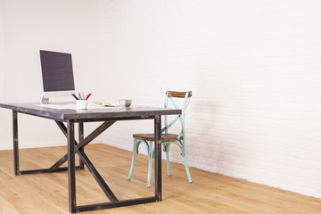 Antique chair and designer desk