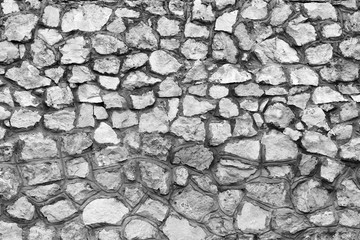 Grunge texture of old white stone walls