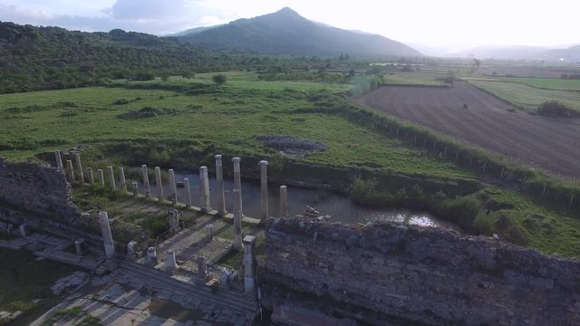 4K Clip of Flying Around Historical columns and Ruins Captured by Drone Cam