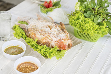 Grilled fish, delicious Asian food of Thailand. Nile tiapia fish or Oreochromis niloticus-mossambicus fish.