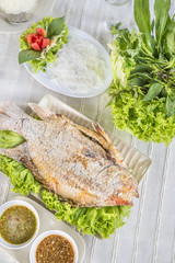 Grilled fish, delicious Asian food of Thailand. Nile tiapia fish or Oreochromis niloticus-mossambicus fish.