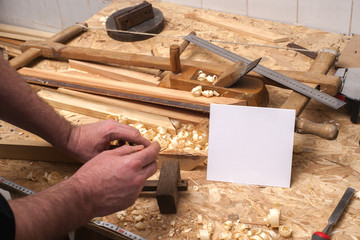 Fototapeta na wymiar carpenter working,hammer,meter and screw-driver on construction background