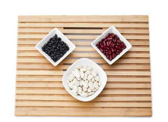 bowl of food grains on wooden platter
