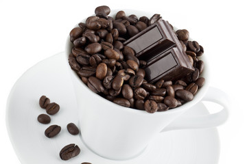 a cup of coffee beans with chocolate