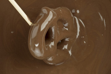 pretzel dipped in melted chocolate