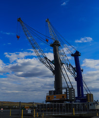 Fototapeta na wymiar Cranes at Port of Albany NY along side the Hudson River
