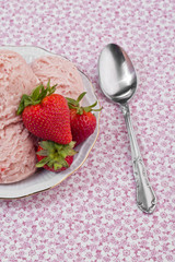 cropped  strawberry ice cream plate and strawberries