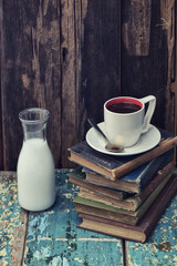 vintage books, with coffee cup and milk on a retro set up