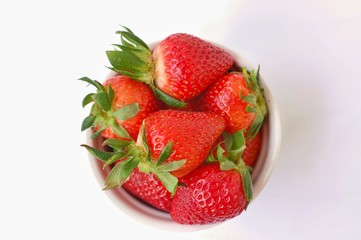 Strawberries on the wooden background