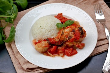 Roasted chicken with basil and tomatoes and rice