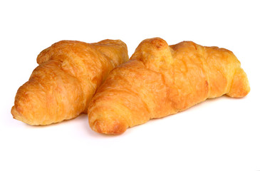 Fresh and tasty croissant over white background
