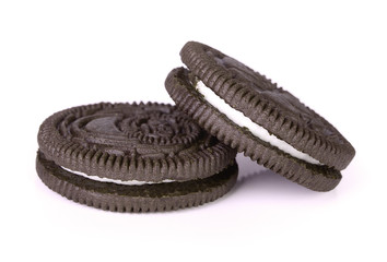 Chocolate cookies with cream filling isolated on white backgroun