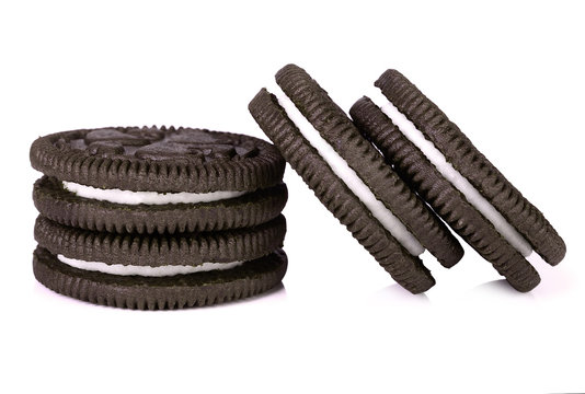 Chocolate cookies with cream filling isolated on white backgroun