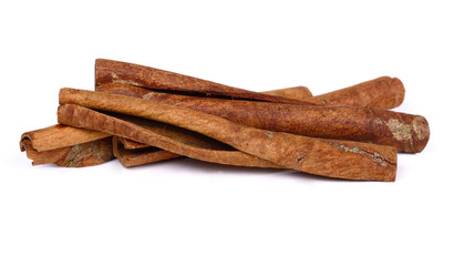 Cinnamon sticks on white background.