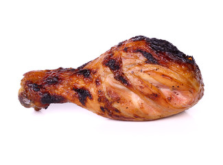 Grilled chicken leg on white background.