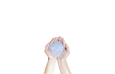 Colored plastic beads on hands