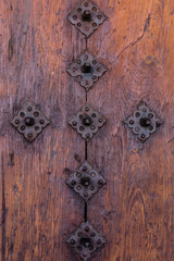 Old doorknob or knocker that serve as decoration on the doors of houses.