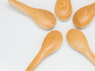 Five Classic wooden spoon on white background and selective focus