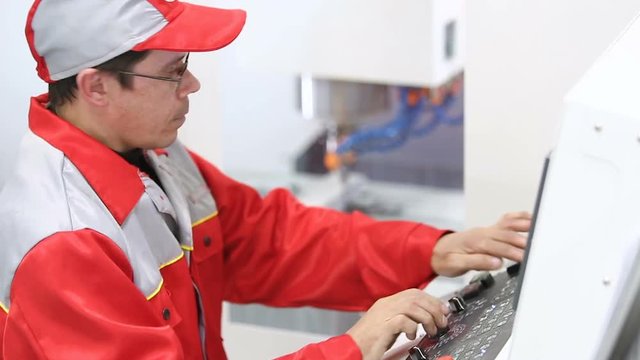 operator CNC machine in industrial manufacturing