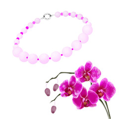 Fototapeta na wymiar Necklace and orchid on a white background