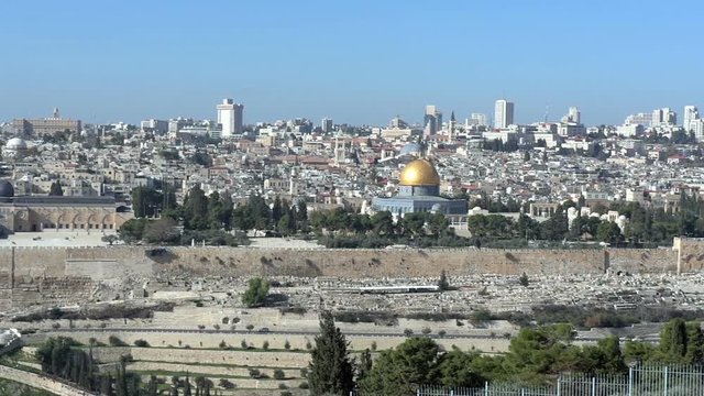 Jerusalem as seen from Mount of Olives. The following landmarks can be seen: Temple Mount in The Old City, The Dome of the Rock and the Al-Aqsa Mosque. Panning shot.