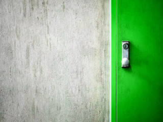 Cement concrete wall texture with modern green door.