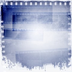 Vintage blue and white film strip frame background.