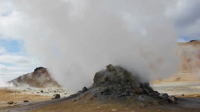 field of mud pools and fumaroles at hverir in iceland mini volcano at lake myvatn