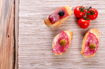 Sandwiches with sausage and jamon.