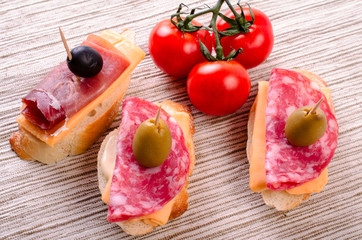 Sandwiches with sausage and jamon.