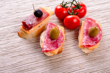 Sandwiches with sausage and jamon.