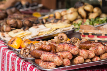 grill sausages on counter in food court 