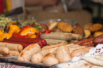 grill sausages on counter in food court 