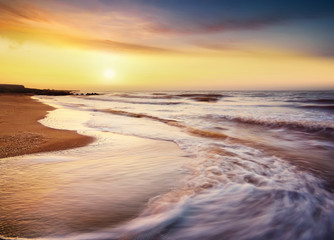 Fototapeta na wymiar Seascape during sundown. Beautiful natural seascape in the summer time