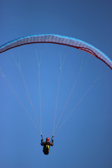 Paraglider on Blue Sky