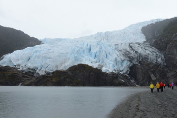 Tourists at the foot of the Aguila glacier. Tierra Del Fuego