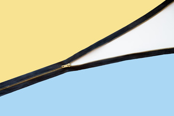 half-open black zippo separates two painted surfaces