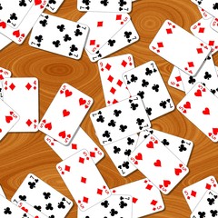 seamless pattern texture background with playing cards irregularly scattered on the woody table