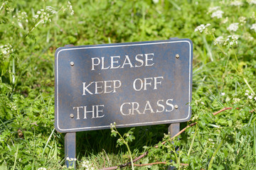 Please Keep off the Grass sign