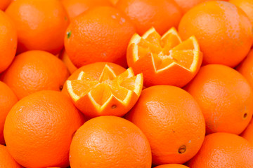 Orange fruits for sale at market stall
