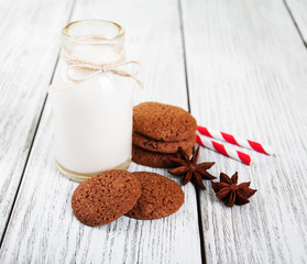 oatmeal cookies and bottle of milk