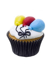cupcake with colorful balloon decoration