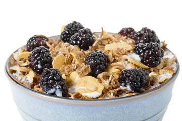 cropped image of blackberry fruits and cereal.