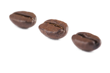 three beans arrange on a white background